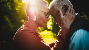 a couple of seniors hugging each other