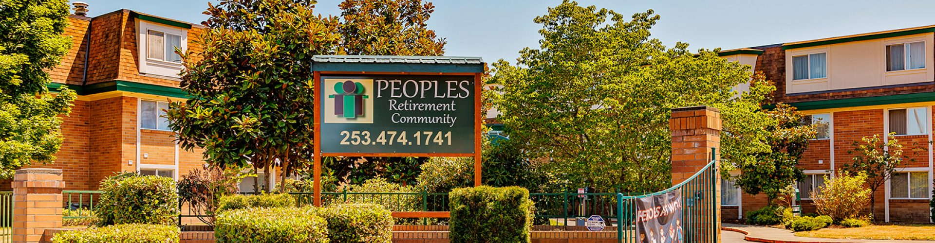 a sign in front of a building